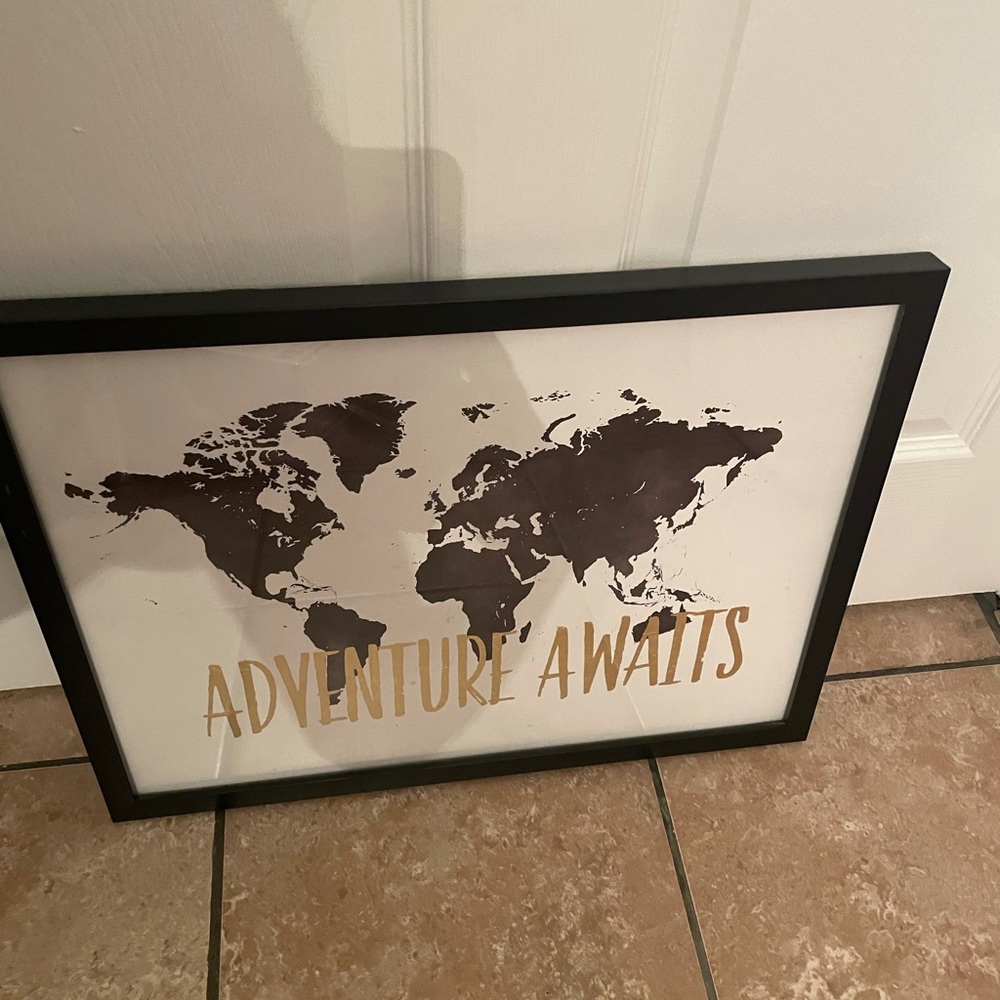 Adventure awaits sign